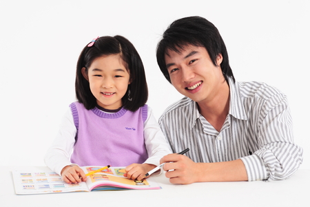 An asian girl and a man smiling - isolated on whiteのeditorial素材