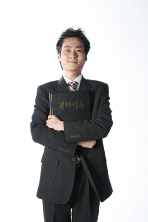 Young Asian businessman posing in the studio - isolated on whiteのeditorial素材