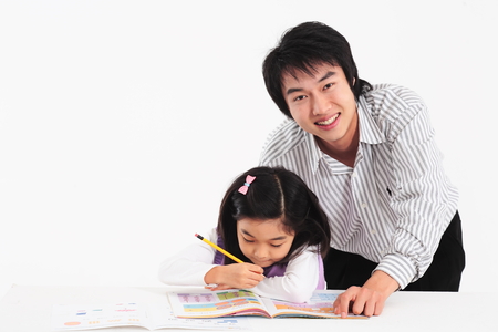 An asian girl and a man smiling - isolated on whiteのeditorial素材