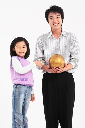 An asian girl and a man smiling - isolated on whiteの写真素材