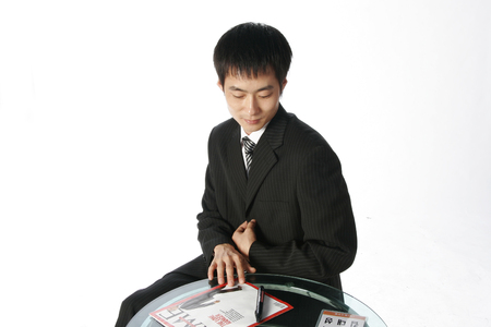 Young Asian businessman posing in the studio - isolated on whiteのeditorial素材