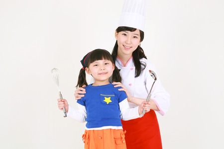 Cooking class with children - isolated on whiteの写真素材