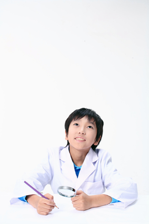 Children in a science class - isolated on whiteの写真素材