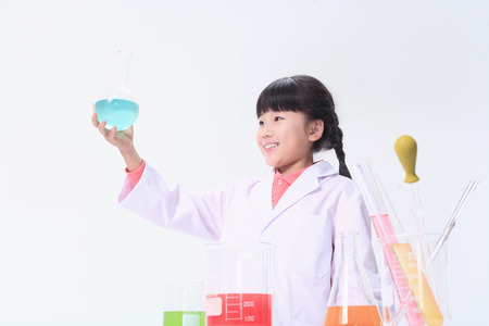 Children in a science class - isolated on whiteの写真素材