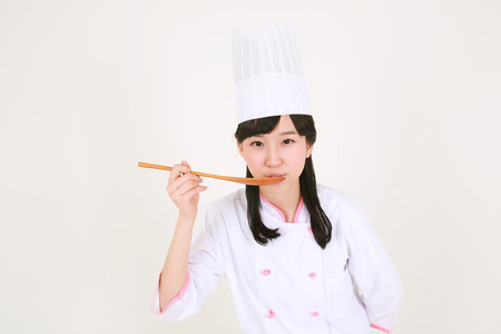 Preparing food - isolated on whiteの写真素材