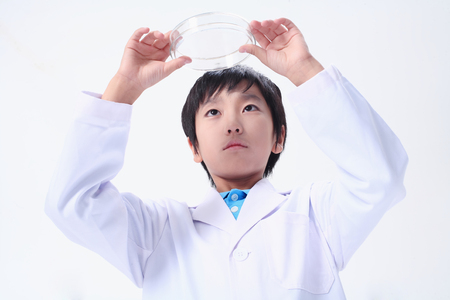 Children in a science class - isolated on whiteの写真素材