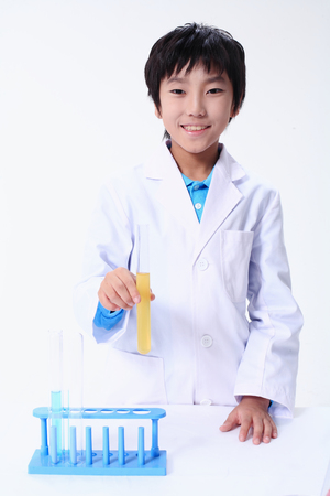 Children in a science class - isolated on whiteの写真素材