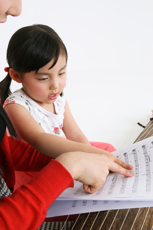 Music class - isolated on whiteの写真素材