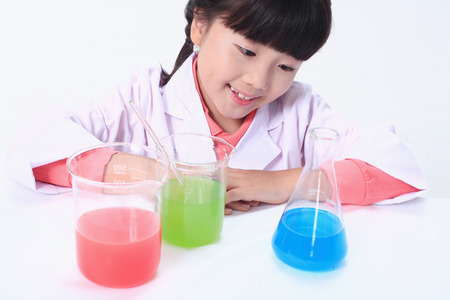 Children in a science class - isolated on whiteの写真素材