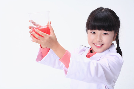 Children in a science class - isolated on whiteの写真素材