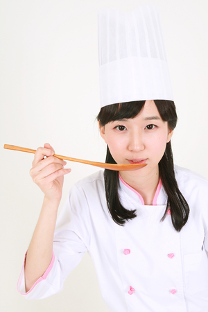 Preparing food - isolated on whiteの写真素材