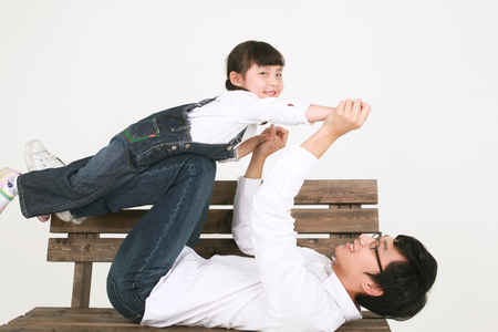 Three generation asian family dressed casually - isolated on whiteの写真素材