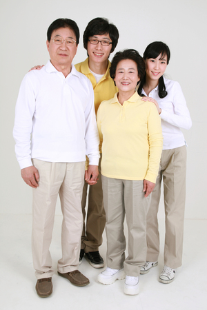 An asian big family dressed casually - isolated on whiteの写真素材