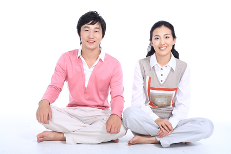 An asian happy family - isolated on whiteの写真素材