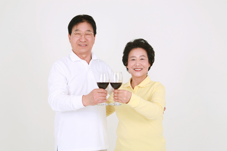 An asian big family dressed casually - isolated on whiteの写真素材
