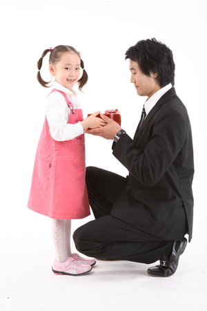 Asian family in Parent's day - isolated on whiteの写真素材