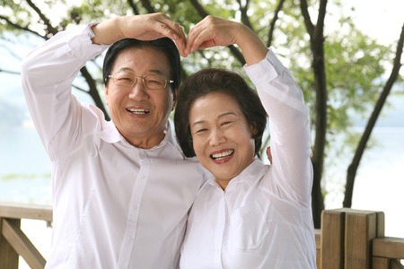Happy asian familyの写真素材