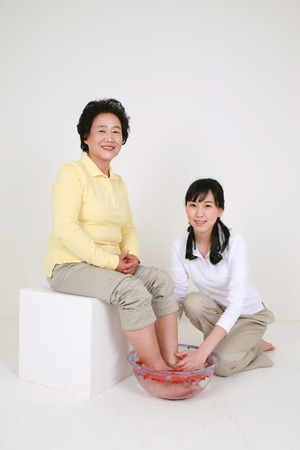 An asian big family dressed casually - isolated on whiteの写真素材