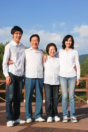 Happy asian familyの写真素材