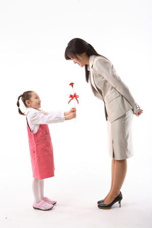 Asian family in Parent's day - isolated on whiteの写真素材