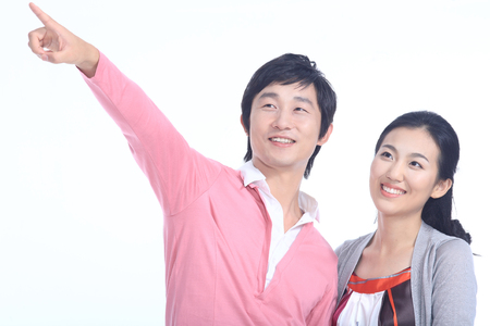 An asian happy family - isolated on whiteの写真素材