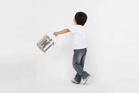 Asian kids with education concept- Isolated on studio shotの写真素材