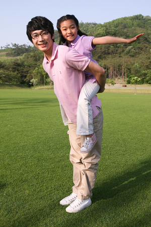 Happy asian family oudoorのeditorial素材