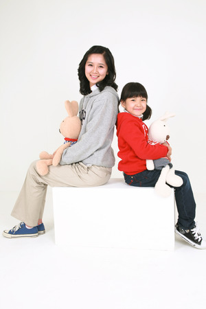 Asian mom and child - isolated on whiteのeditorial素材