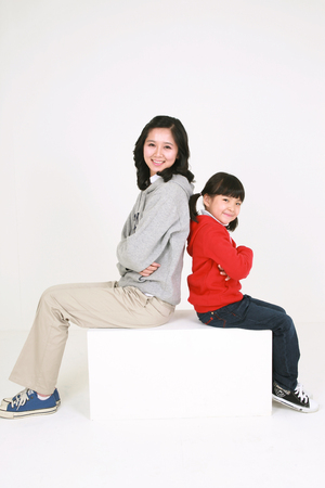 Asian mom and child - isolated on whiteのeditorial素材