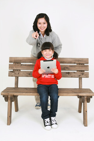Asian mom and child - isolated on whiteのeditorial素材