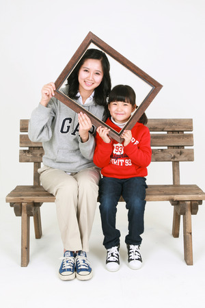 Asian mom and child - isolated on whiteのeditorial素材