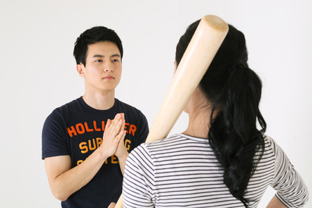 Asian couple in studio - isolated on whiteのeditorial素材