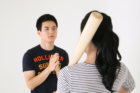 Asian couple in studio - isolated on whiteのeditorial素材