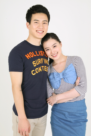 Asian couple in studio - isolated on whiteのeditorial素材