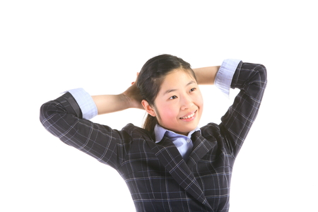 Asian businesswoman posing in the studio - isolated on whiteの写真素材