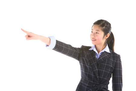 Asian businesswoman posing in the studio - isolated on whiteの写真素材