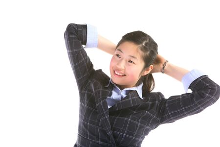 Asian businesswoman posing in the studio - isolated on whiteの写真素材