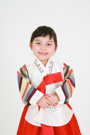 Korean little girl with traditional clothing - isolated on whiteの写真素材