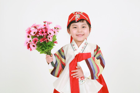 Korean little girl with traditional clothing - isolated on whiteの写真素材
