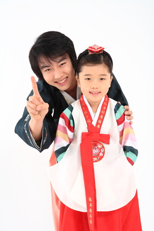 Korean family with traditional clothing - isolated on whiteの写真素材