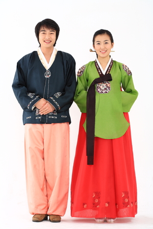 Korean couple with traditional clothing - isolated on whiteの写真素材