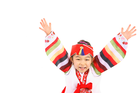 Korean little girl with traditional clothing - isolated on whiteの写真素材