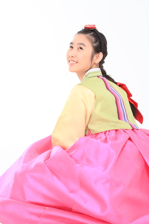 Korean teenage girl with traditional clothing - isolated on whiteの写真素材