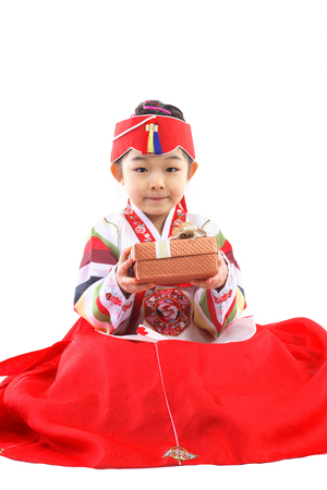 Korean little girl with traditional clothing - isolated on whiteの写真素材