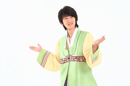 Korean young man with traditional clothing - isolated on whiteの写真素材