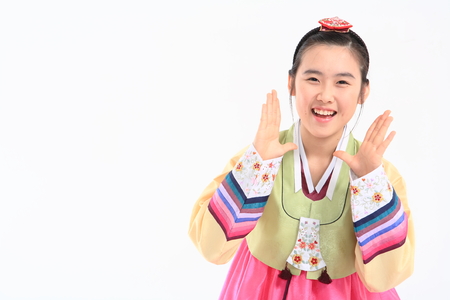 Korean teenage girl with traditional clothing - isolated on whiteの写真素材