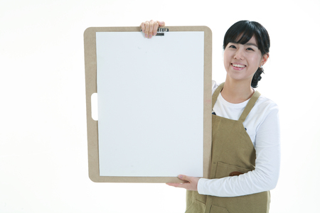 Asian woman majoring in art - isolated on whiteの写真素材