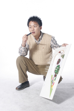 Asian man majoring in architecture - isolated on whiteのeditorial素材