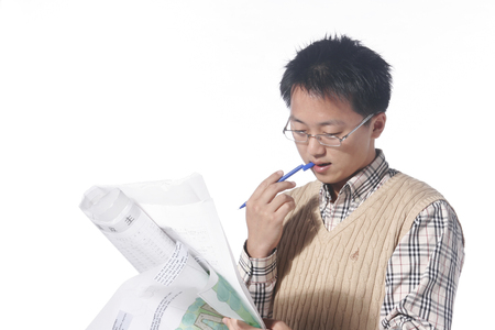 Asian man majoring in architecture - isolated on whiteのeditorial素材