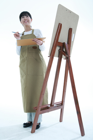 Asian woman majoring in art - isolated on whiteのeditorial素材